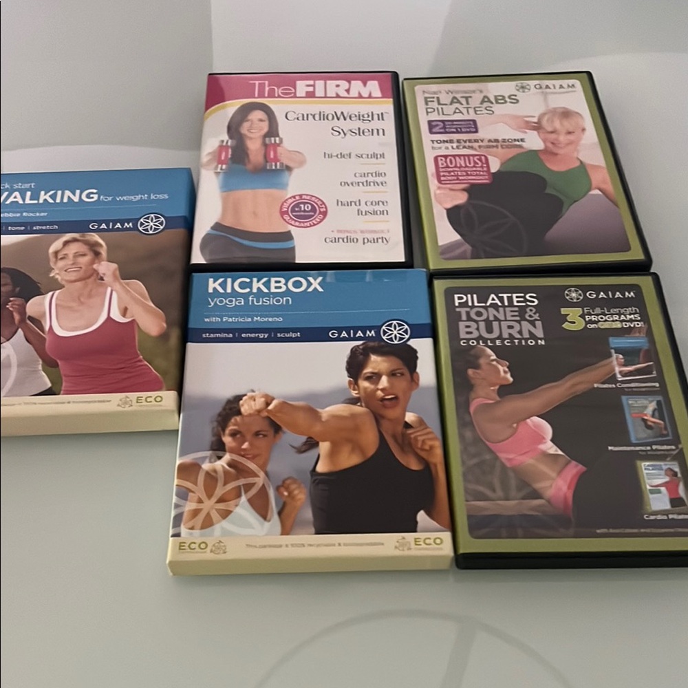 GAIAM Fitness DVD Set with Pink, Blue, and Black Covers